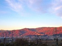 夕日を受けて、燃え上がる諏訪の山々